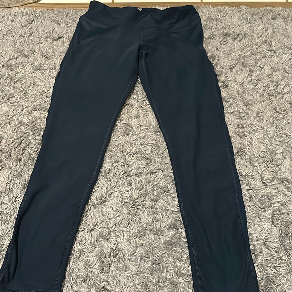 Women’s atheletic leggings, size medium